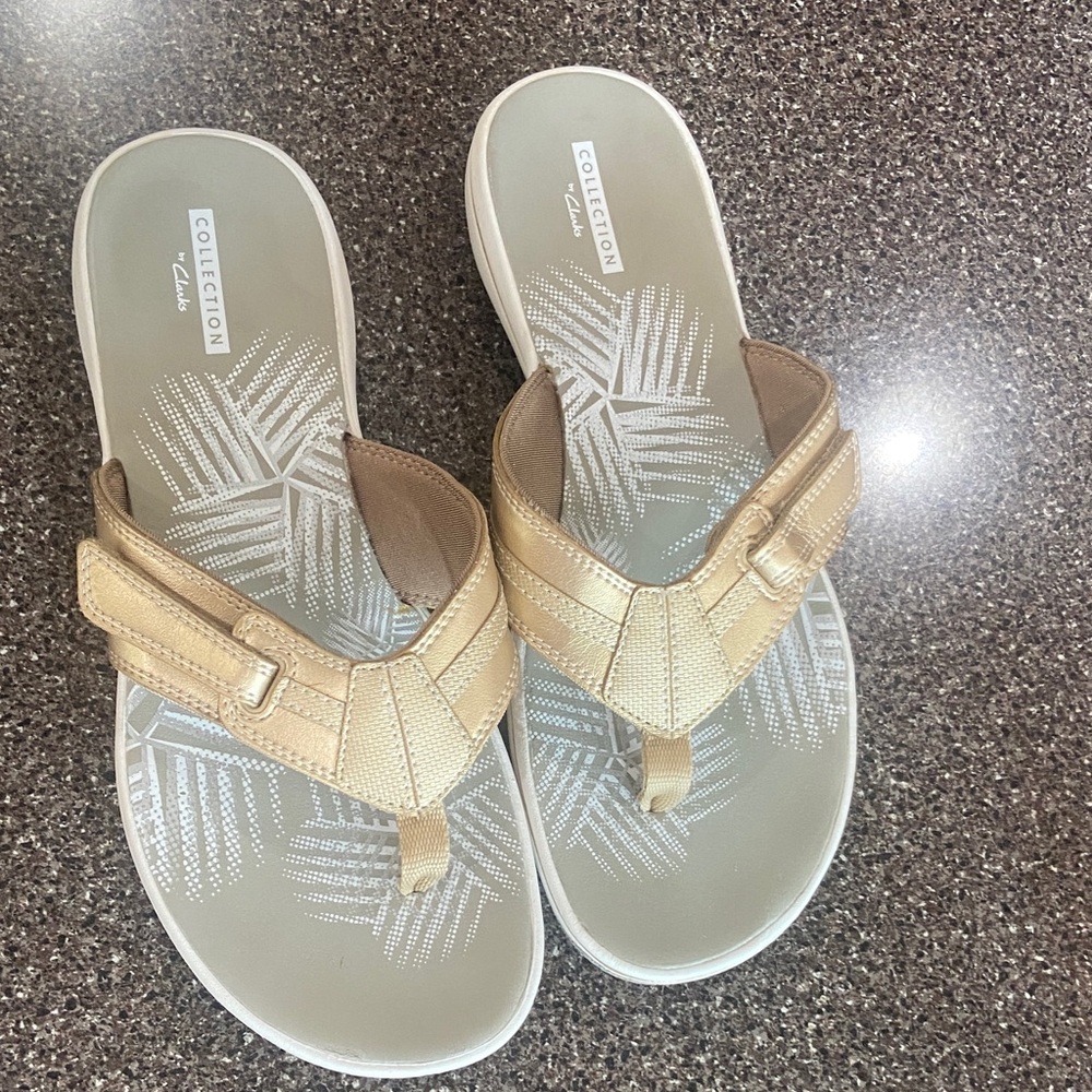 Clarks Women's metalic gold sandals